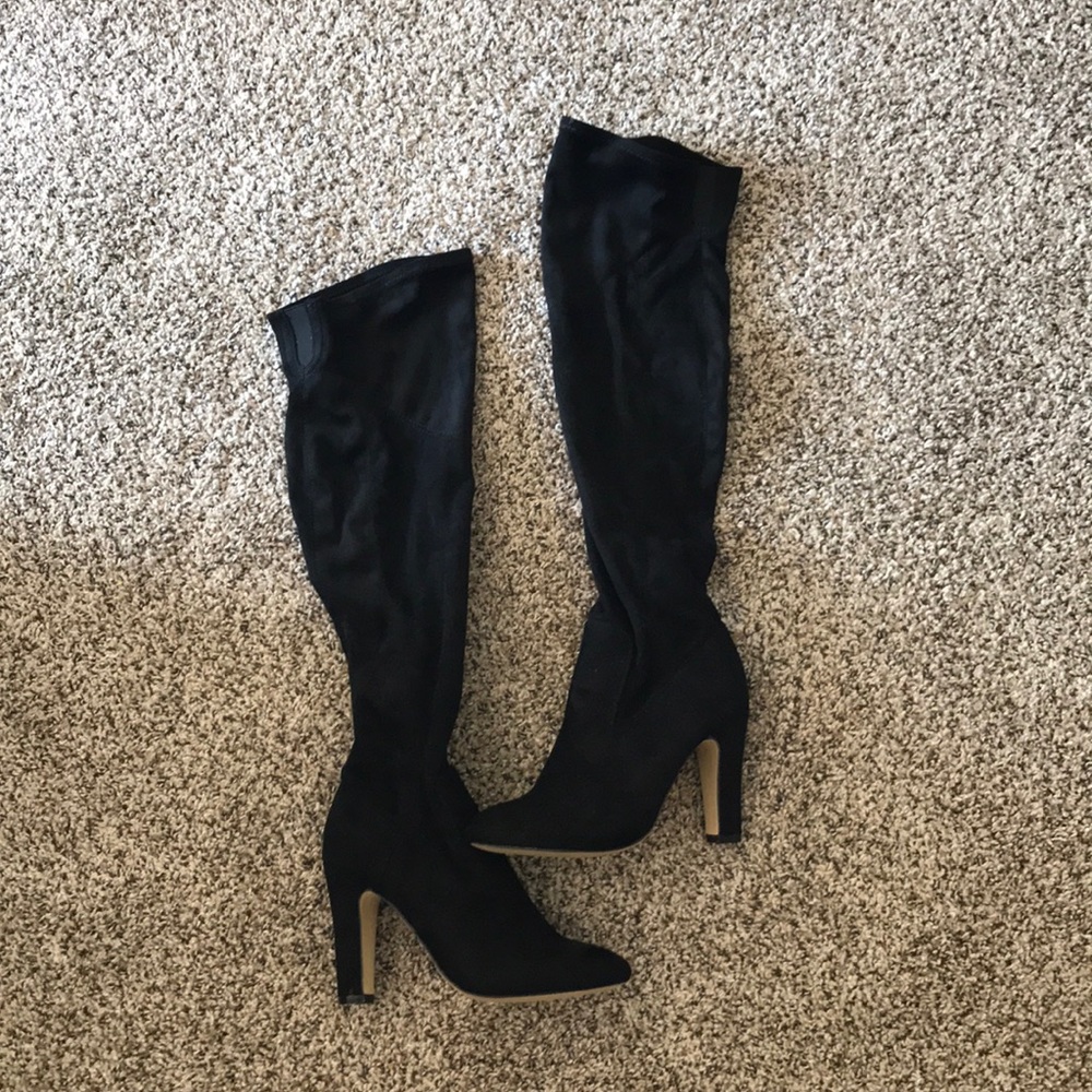 Tall heeled black suede boots